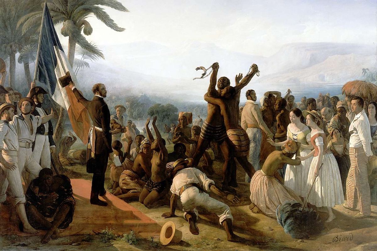 A crowded painting of the proclamation of the abolition of slavery in the French colonies: a uniformed official reads from a document on a platform while formerly enslaved men and women celebrate, embrace and raise their arms around him.