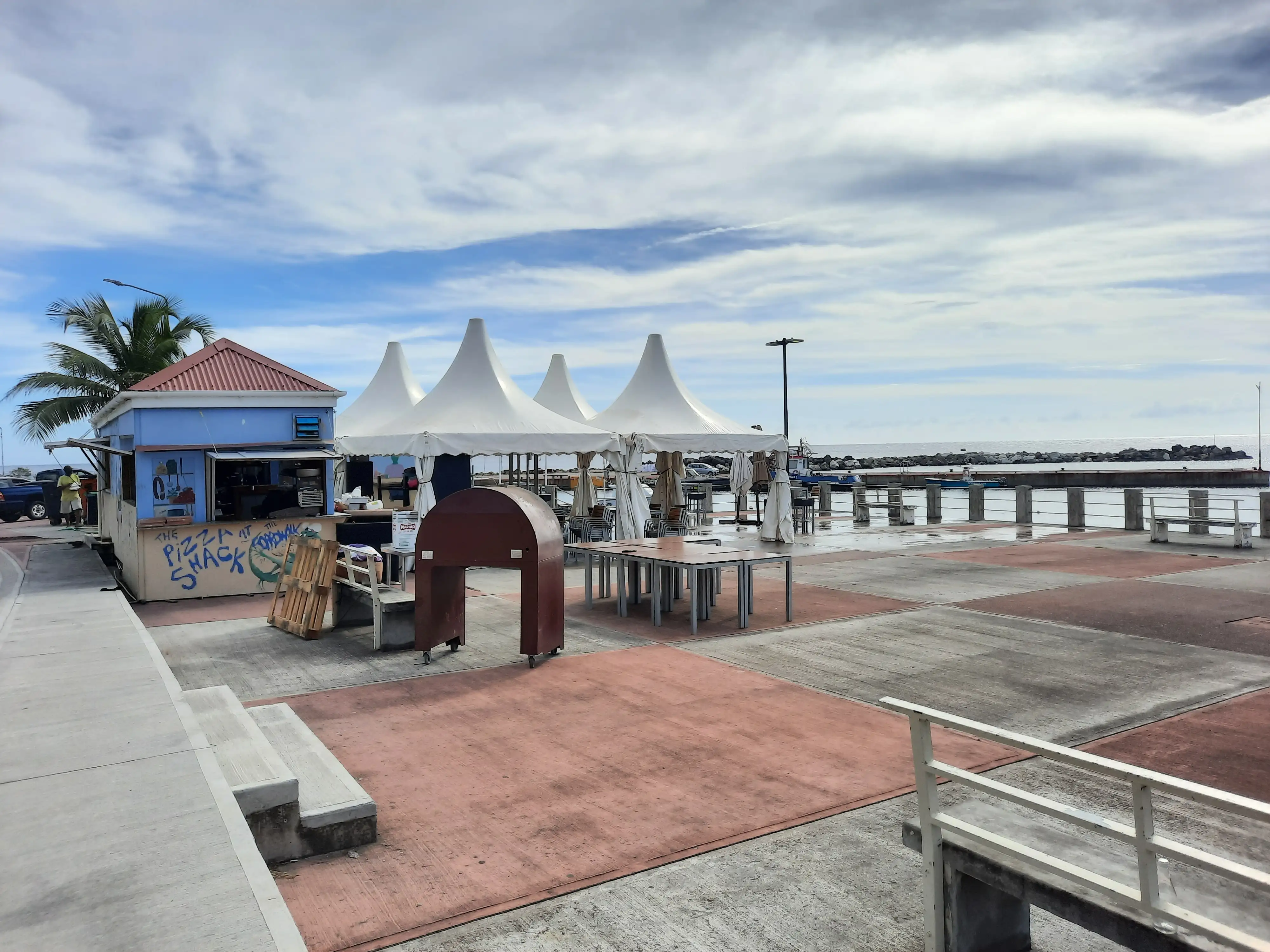 The Zeeterras sea terrace on the waterfront at Oranjestad, a paved terrace with railings looking out over the bay